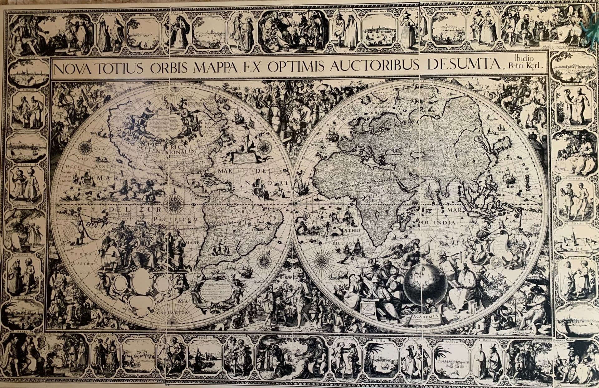 An old fashioned black and white, double hemisphere wall map, featuring images of Roman Gods, famous historic mathematicians, cartographers and astronomers, as well as other decorations. The map sits within an ornamental and illustrated border.
